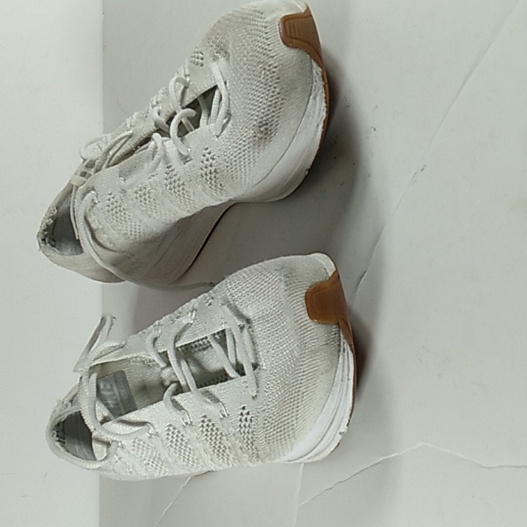 Nike, Woman Flyknit Trainer White/Gum Sole Shoes That Size 8.5.